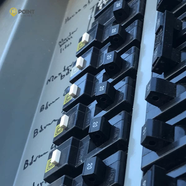 Image of a fuse box that would typically be found in a residential home.